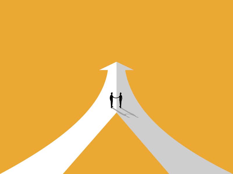 Illustration of two people agreeing on the same arrow path.