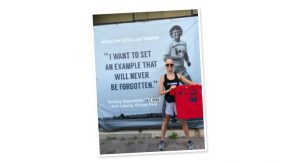 Photo of Dr. Barbara Tatham in front of a poster of Terry Fox with the quote: "I want to set an example that will never be forgotten."