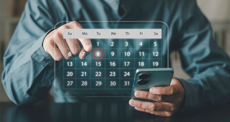 Person looking at a digital calendar