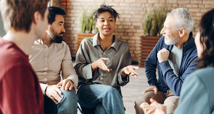 Group of people talking together