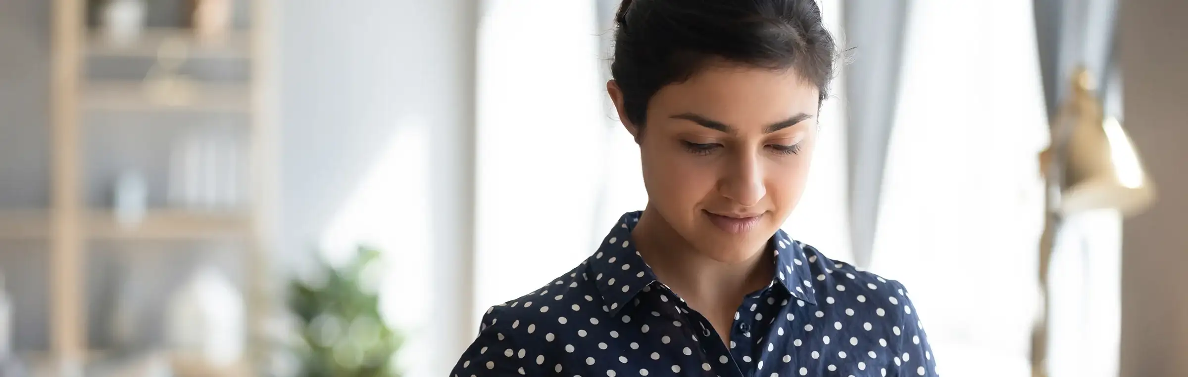 Photo of someone browsing a tablet.