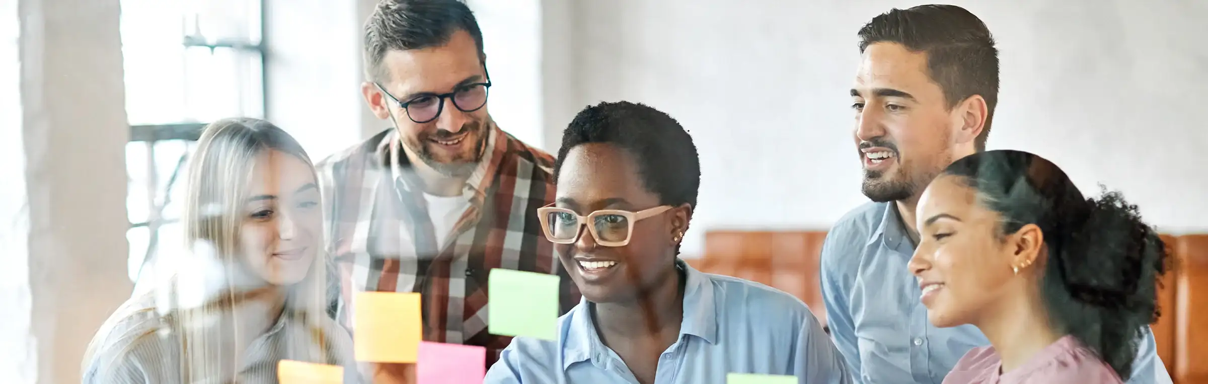 Photo of someone engaging and leading a diverse group.