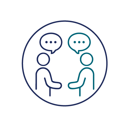 Two people facing one another with speech bubbles, representing respectful communication and mutual understanding.