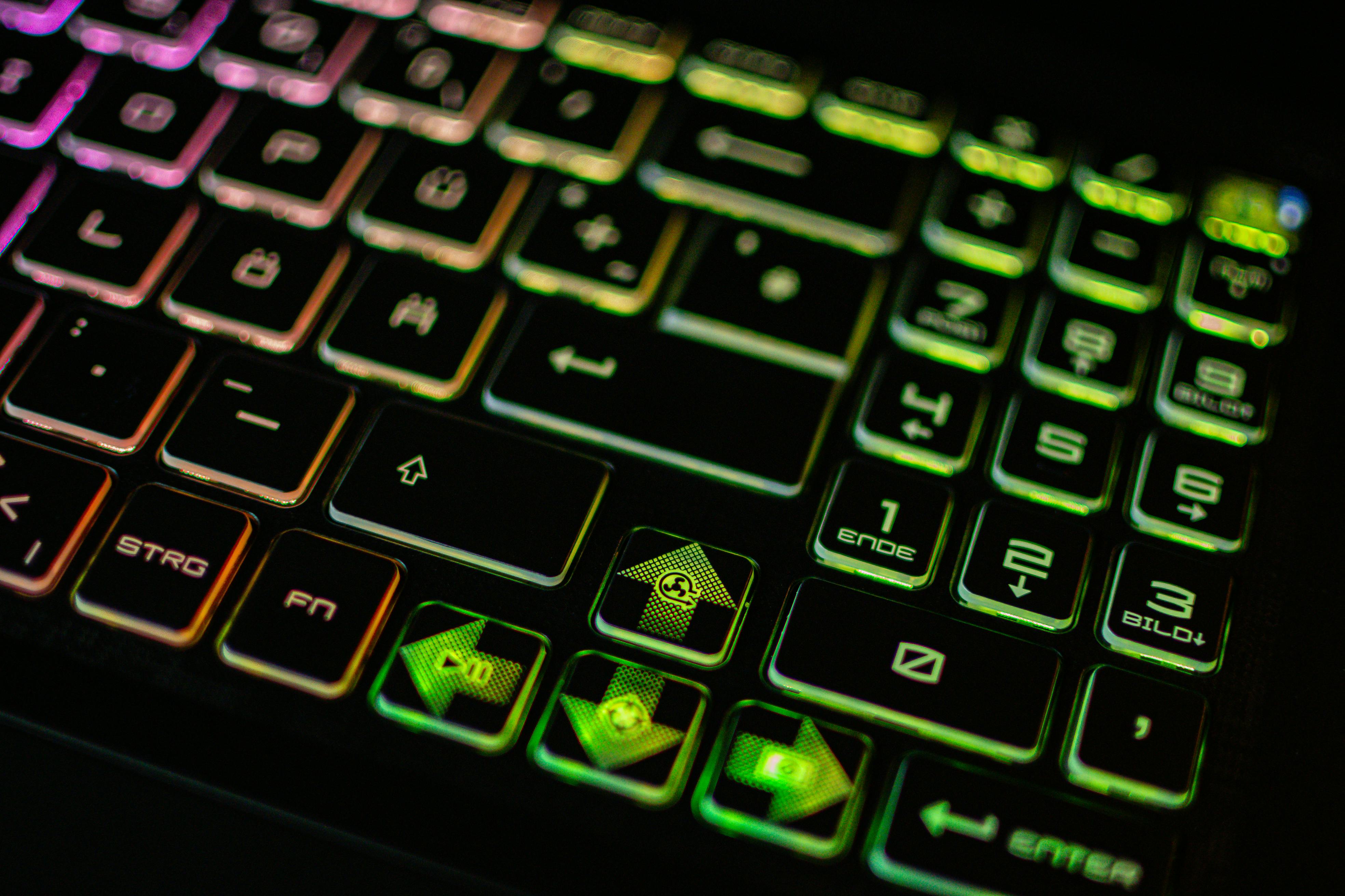 Several neon symbols of devices and technology,